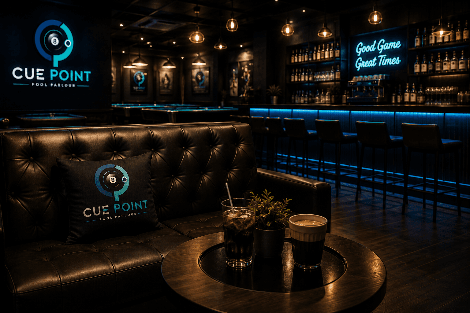 Leather booth and cocktail bar in the Cue Point lounge